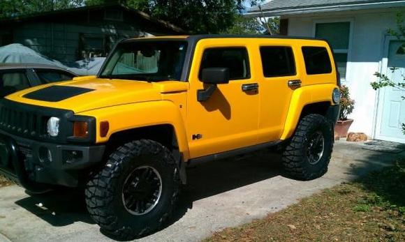 bed liner on the grille and mirrors and hella light covers. new 35 nitto mud grappler tires.