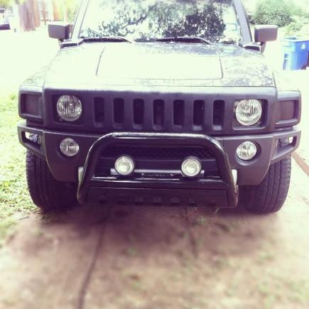 added bull bar and rubber coated off road lights   texture painted black grill