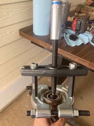 Bearing puller to remove the broken piece.  