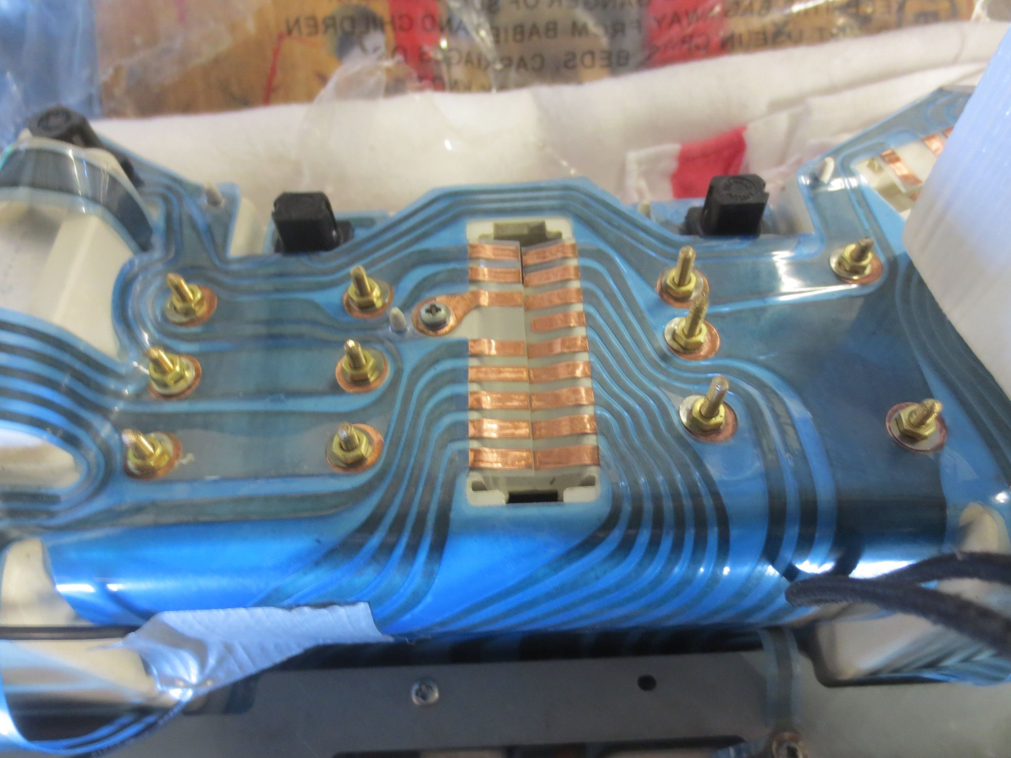 Threaded rod and nuts now holding the guages. 