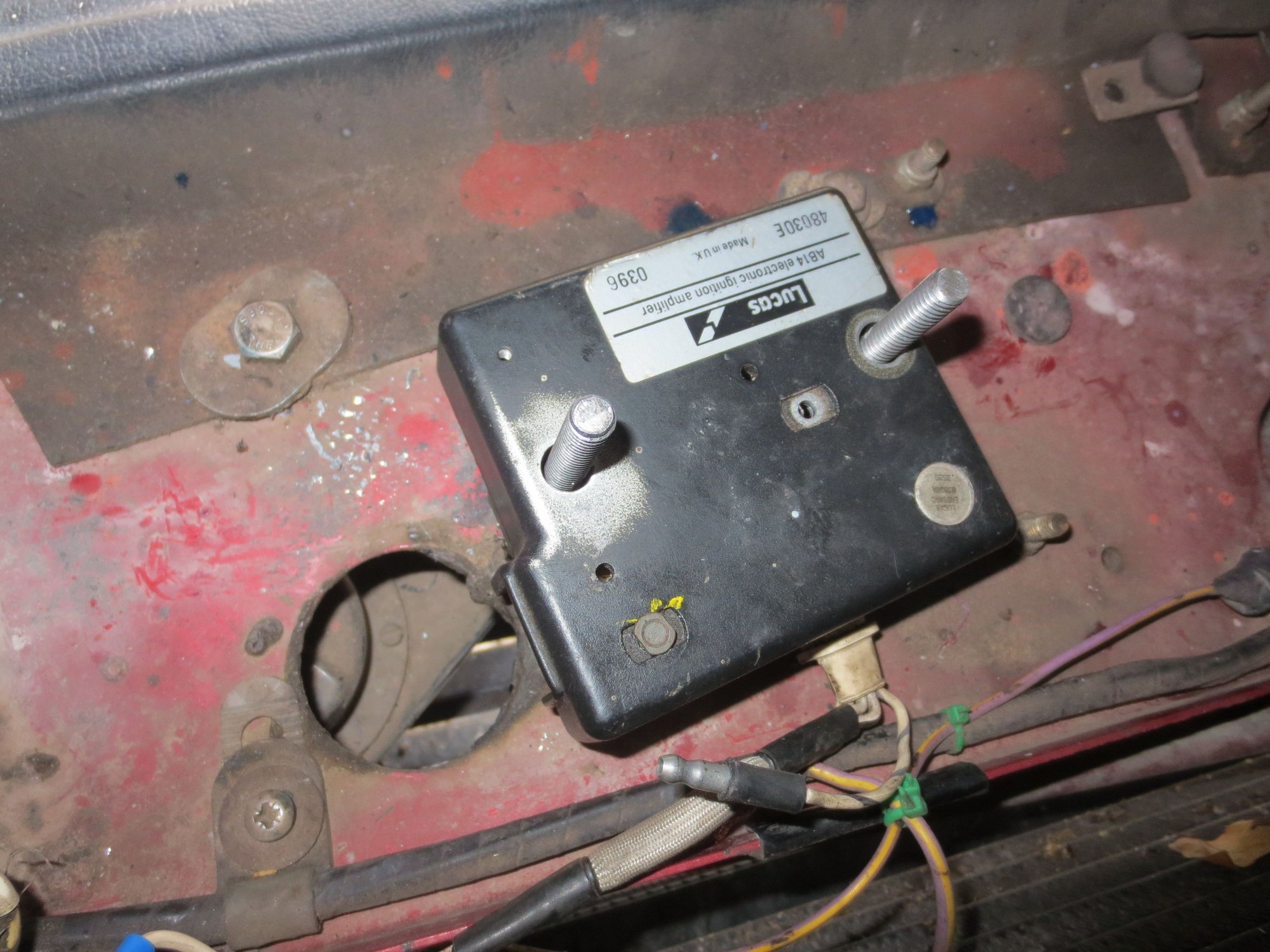 earth wire to LHS rad crossmember earth bolt. All the coil/tacho/dizzy signal wires run to the engine using ordinary wires in wrap.