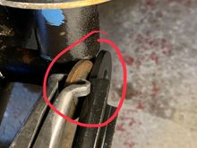 There was a thin washer between the shock and bracket at the rear. (Note: pliers not needed to remove, just using these so my fat sausage fingers don’t obscure the view!) 