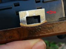 pull both tabs up and slide off the cover
