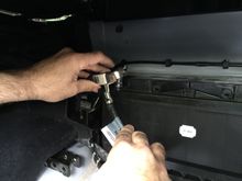 25. The same socket loosens the cable mount, until it is free and can be pulled off the battery terminal.