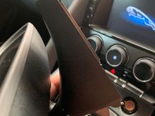 Then gently rotate cover in a anticlockwise direction as shown in relation to this photo angle. Once side tabs are disengaged cover can just be pull forward and off