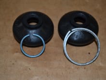 These are the top and bottom ring spring clips.  I could not reinstall them.  I tried, different approaches to no avail.  Ended up using zip ties...  much easier. 