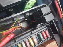 It goes back into the big wiring bundle (going to the back seats.