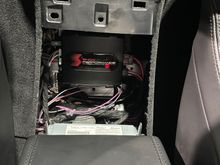WMI controller installed into dead space behind the armrest.