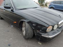 Death of a friend. Young gal thought her Nissan looked better with my Jag frontend.