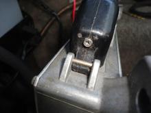 Screw securing connector cover that protects wires. I removed the screw and the cover slides off to expose the wires