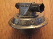 Original vacuum valve showing air hole where it leaks.