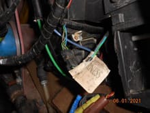 Harness from control unit connected here. Left side of console