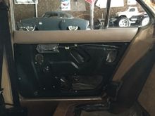 One of the reasons I took the  rear seat out was to get access to the right side rear door card.  The door was stuck closed and the only way to access the panel was from the inside .