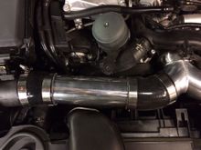 Both 45 degree couplers have about 1.5" of length on each end cut off to get the pipes to lay correctly and clean up the excess silicone overlap