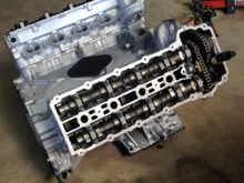 Getting the rebuilt motor ready for installation.