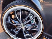 Close up on rim. I got the chrome rims sprayed with a tint of black chrome to match the cars paint. Also got the center cap for rim made with the Jaguar logo!