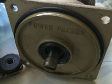 Motor side. Notice the notch on tip of drive shaft that engages flat bar on pump side. Also the large external ORing. Greenish oily liquid as lubricant. (Pentosin?)