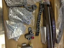 Got the LS timing kit. Everything is the same with the exception that the one I ordered comes with the 4.2 primary chains. So tensioners and guides are the improved design and secondary chains are the same.