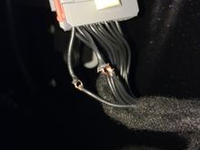 Here is the door side of the mirror harness connector. Pin #12 ground and #13 power as before. Notice how I cut the insulation only leaving the conductors in tact and then using a small pick, make a hole to insert the new wires through and then rapped them, soldered them and re-insulated.
