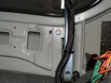 Woven conduit up the hinge is probably overkill but I let is stay....