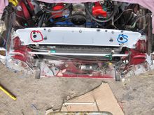 View of rad cover plate from above from the front. Bung accessible through the hole. The size is a Whitworth hex, believe it or not! Use a copper washer or a fibre washer if sealing washer is toast.