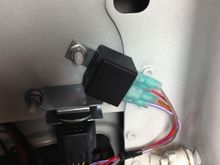 Here is the relay for the Negative trigger reverse wire in the vehicle.