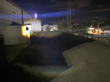 This picture is of a single High beam projector aimed at the vet's office and towards the building to my left. 