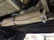 Temp cover on hot pipe during trans refill/level check.