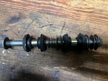 Passenger side how came off vehicle. Three shims. Note no dished washer on left and two on right