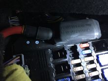 Passenger side fuse box under glove compartment