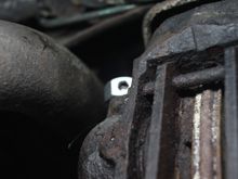 Drilled Nut with the Hole in placed over the Brake Bleed Nipple already for 'Spot Welding'