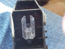 After removing greu rubber and circuit board, this is inside of switch. IMPORTANT do not invert. There are 2 black plastic plungers loose.