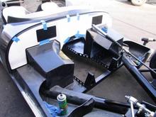 STOP!  Time to back up.  Now we had to get the chassis ready - just when we had so much momentum going for us from completing the drive train.  

So, first thing to do was to take the hood back off the car again and to install the aluminum firewall