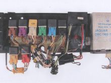 This is what is mounted under our 1988 glovebox. The part I have been looking for has a few different names that I can see. Some have called it a  climate control interface.