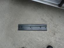 clips that secure threshold plate molded into plate