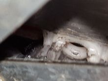 This is the white nylon connector.  Regulator should snap into this.