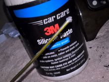 a dab of 3M onto all moving contacts for smooth feel,that is the wire coat hanger piece