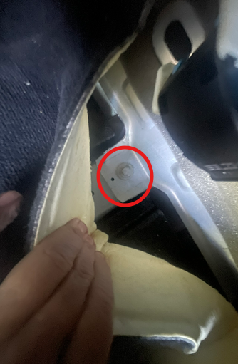 The carpet is VERY stiff and difficult to pull back, to access the bottom 10mm bolt.