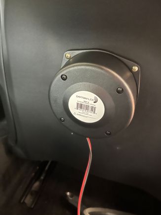 Screwed into the back with 1cm long screws. Will leave 4 small holes if removed in the plastic backing but no one will ever see that area in reality unless you take your seats out of the car. Unit can also be tucked under the plastic  seat backing without screwing but then quite low which is still fine.