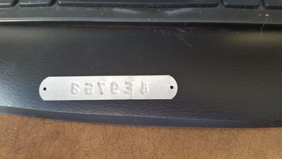 backside of tag showing depression