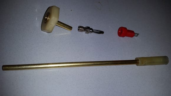 I sacrificed my horn button tube to put a button disconnect at the top so I can remove my steering wheel if need be.  I tapped an 8-32 thread in the banana plug and button tube for a brass stud, then soldered it all, then heat shrink it.  Soldered the red jack on the column wire with heat shrink. 