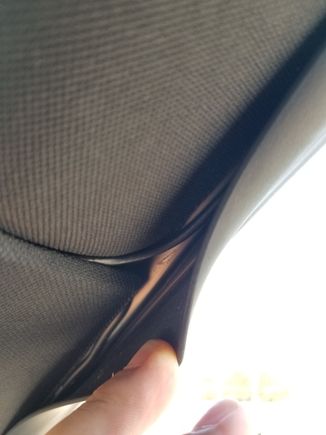 Route the wire between the two trim pieces on the passenger A pillar, route the camera wire from the door rubber trim at top towards the rear of the car.