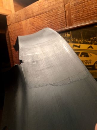 Body filler spatulas whirl great for spreading. They bend in two directions at once.