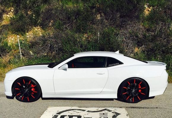 here they are on white Camaro with the black and red, but with red calipers. Do I paint my black to red to have this look or would it be too much with the red car???