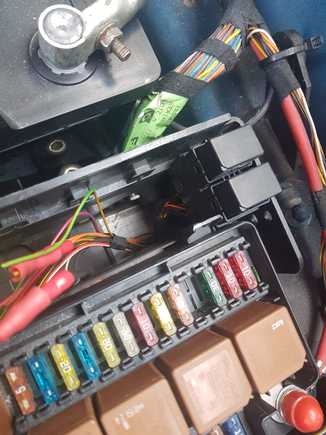 It goes back into the big wiring bundle (going to the back seats.
