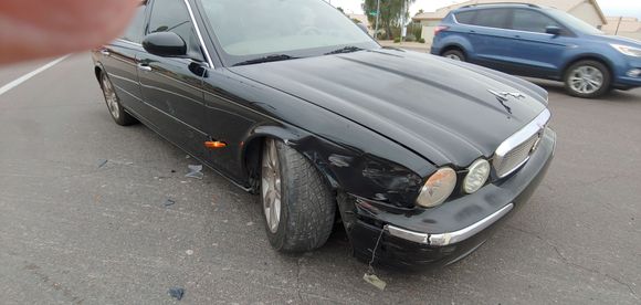 Death of a friend. Young gal thought her Nissan looked better with my Jag frontend.