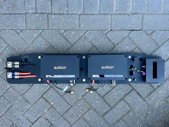 Amps and digital ethernet decoder mounted to ABS panel.