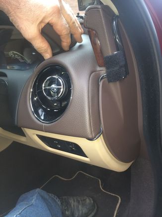 This needs a tidy up at some point, there are two cables behind the tape, the padding protects them when the door shuts, they are not visible with the door shut. If you only had one cable it would be easier to hide.