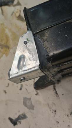 New mounting tab fabricated, and mating joints sealed. 