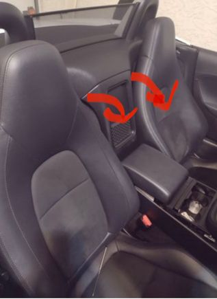 Since no one has answered yet …….Just pull forward from the top. Just non breakable clips here where  the arrows are. Once top is loose just lift the entire panel upwards as sits on some vertically oriented pins at the base. 